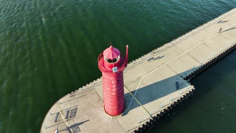 close aerial movement around thee old lighthouse on the southside of the channel