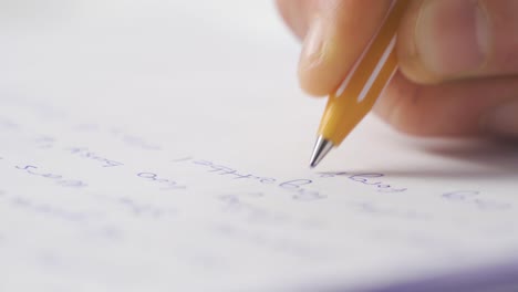 close-up of hand writing notes in the office.