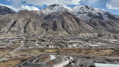 drone aerial of provo utah skyline with mountains