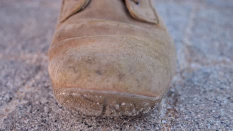 Video-shot-of-a-person's-brown-shoes