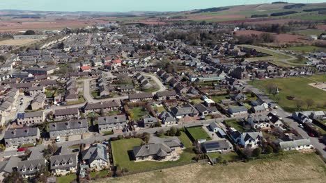 Aerial-view-of-the-Scottish-town-of-Laurencekirk-on-a-sunny-spring-day,-Aberdeenshire,-Scotland