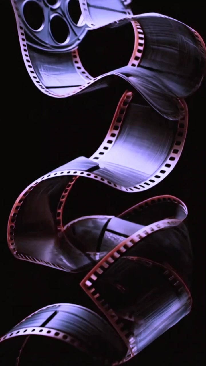 Tira de Filme Cinematográfica em Espiral Descendo de um Rolo