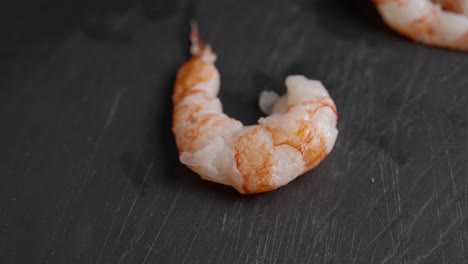 chef cuts shrimp to prepare cebiche