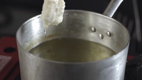 deep frying food in a pot
