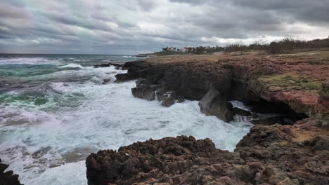 Rocky-coastline-with-waves-crashing-against-the-shore