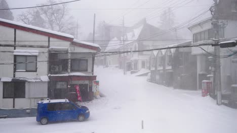 blizzard in akakura onsen ski resort, slow motion