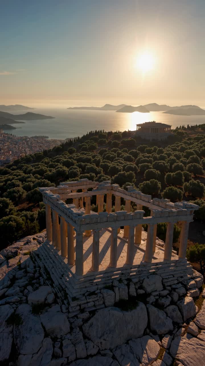 Aerial video captures ancient ruins at sunset, highlighting classical architecture with a sweeping