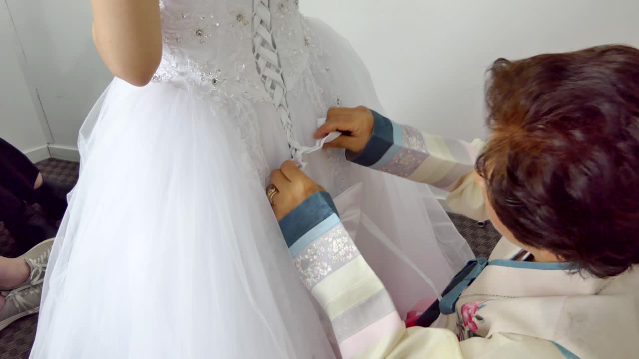 wide shot of  bride - bridemaid wedding dress