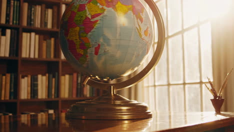 antique globe in a library