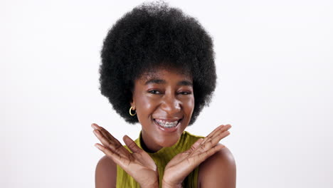 portrait of a smiling woman with afro