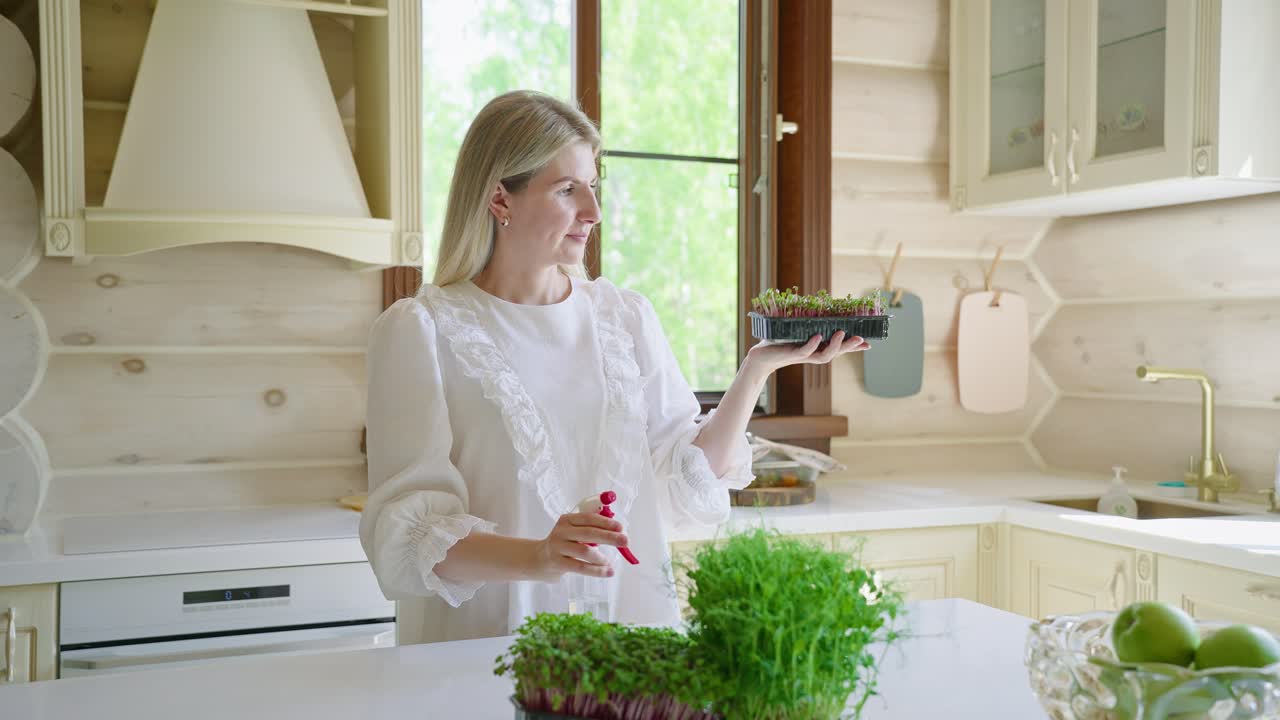 Woman Examining Microgreens in Kitchen