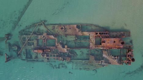 4K-overhead-clip-over-a-shipwreck-in-the-tropical-beach-of-Epanomi,-Norhtern-Greece