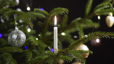 Christmas-tree-festive-candle-decoration,-winter-interior-festivities,-closeup