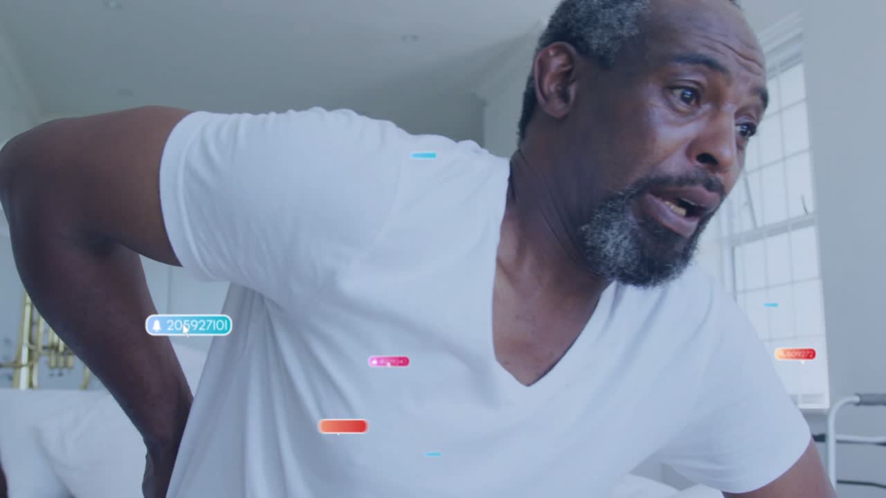 Middle-aged man wincing and sitting up in bedroom, with floating icons mapping back pain relief