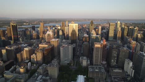 aerial view toward downtown montreal, sunny, summer evening in quebec, canada