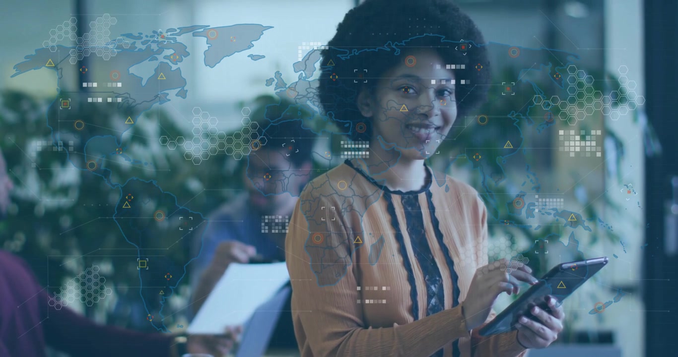 Female tech professional tapping tablet in office, causing world map and data node overlays