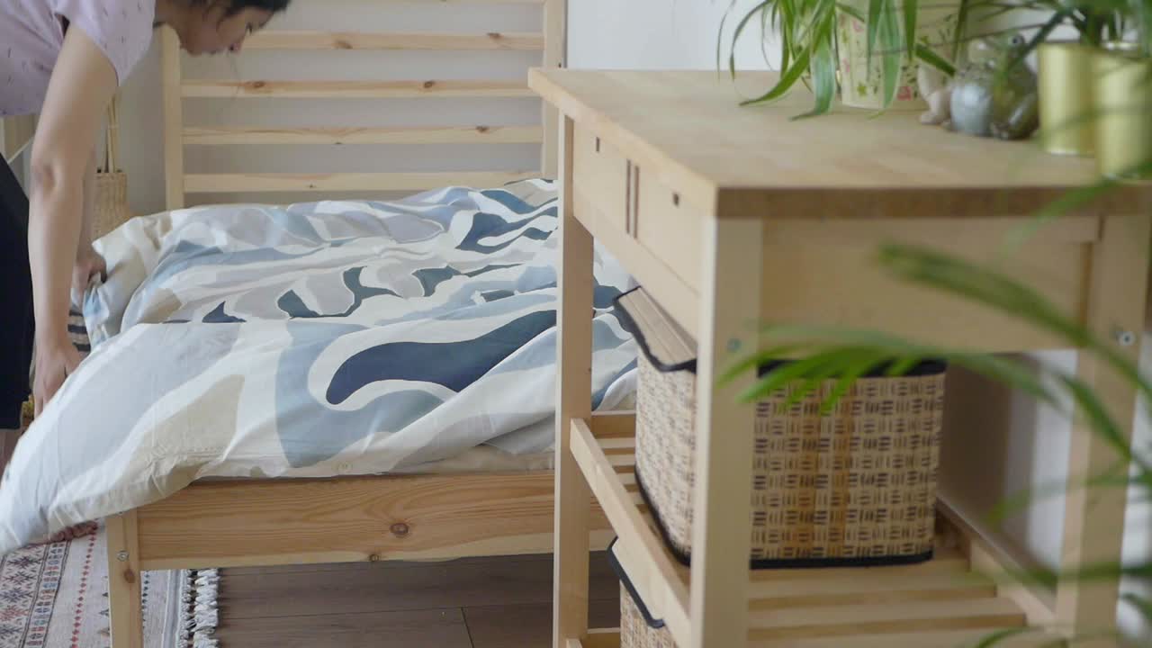 Bedroom Interior with Wooden Furniture and Plants