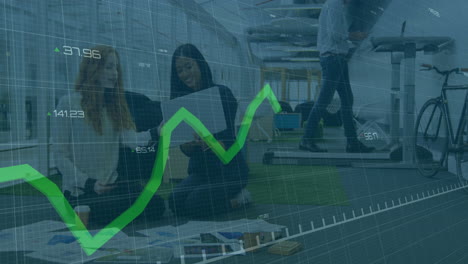 financial graph animation over business people working in modern office