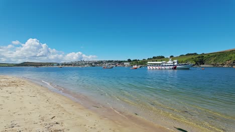 pan from left to right of view across estuary of padstow from daymer bay, cornwall, uk