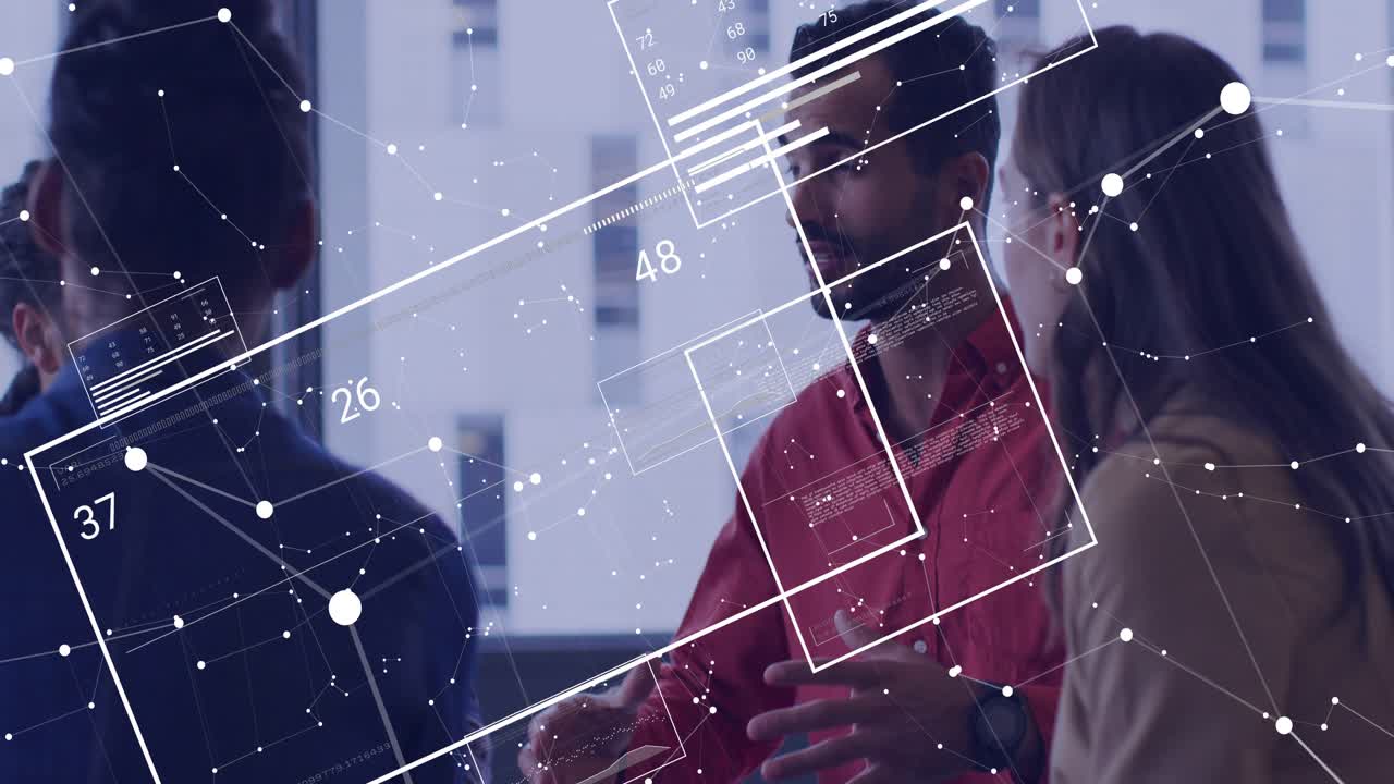 Man in red shirt holding cup explaining data, panels updating draping over team for analytics