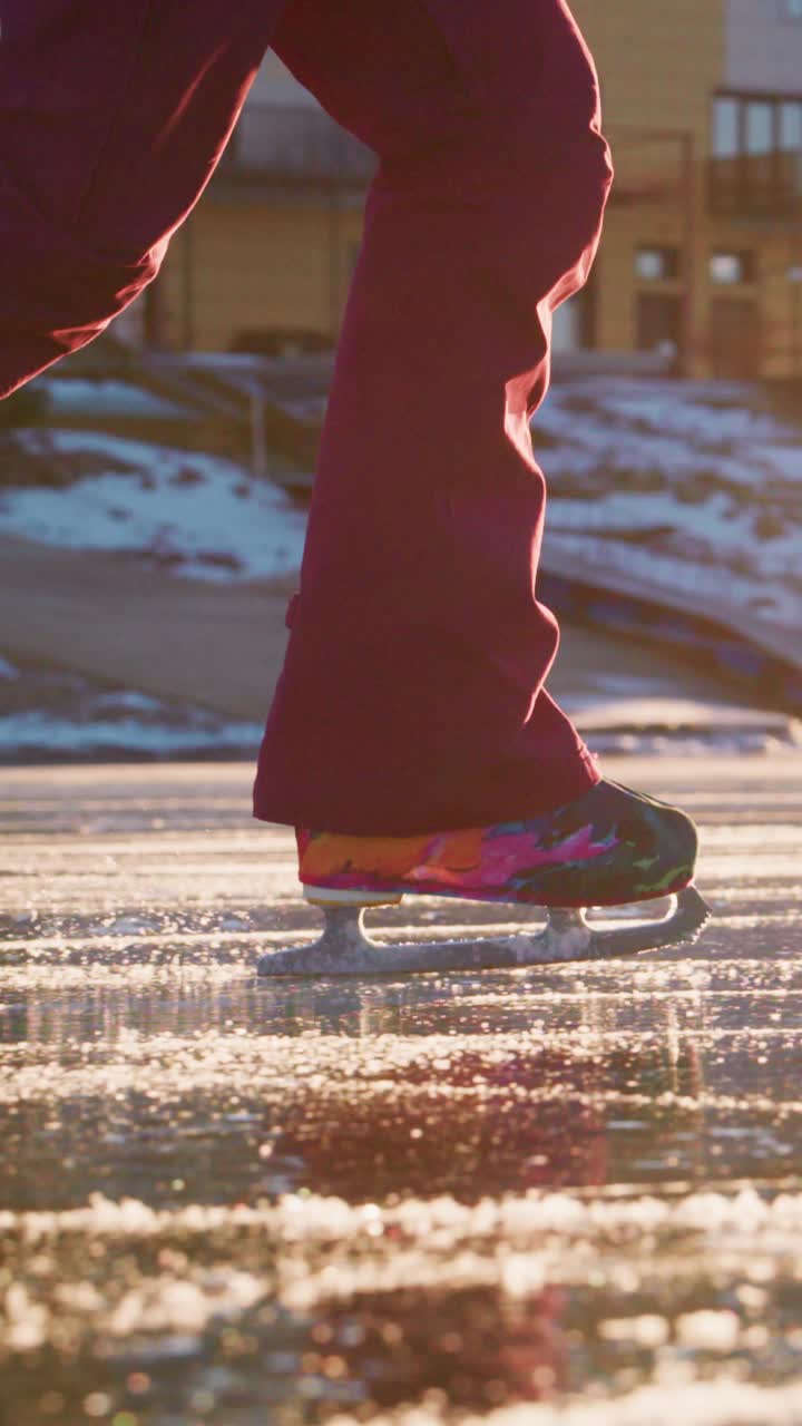 A Dynamic Ice Skating Experience Captured in Motion as Colorful Skates Glide on a Shimmering Frozen Surface, Showcasing the Joy and Elegance of the Sport in a Vibrant Winter Setting