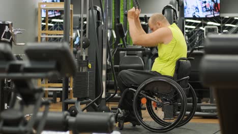man with disabilities training in the gym of rehabilitation center