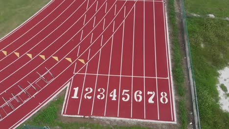 aerial of a high school track field starting line