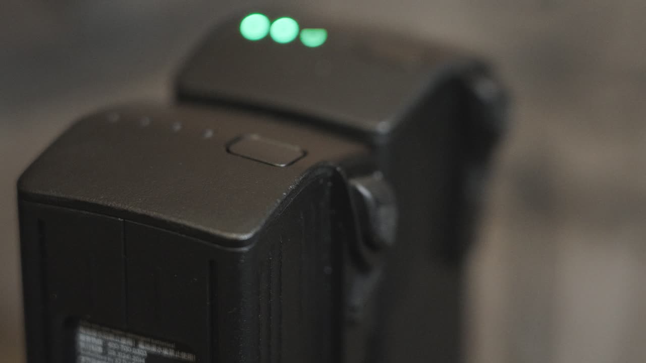 Close up with FX3 of Drone Batteries recharging.