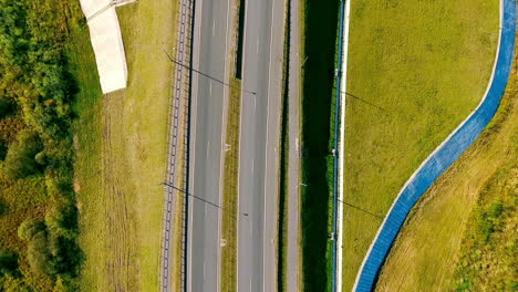 top view cars and cargo truck moving on highway. cars driving over bridge