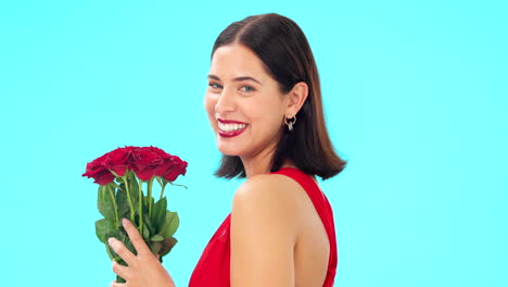 Face,-woman-and-rose-bouquet-in-studio-on-blue