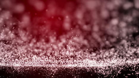 chaotic movement of glowing particles on a red blurred background. fine dust in the air. looped animation of white soft dots.