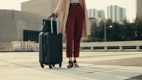 travel, suitcase and businesswoman waiting in city