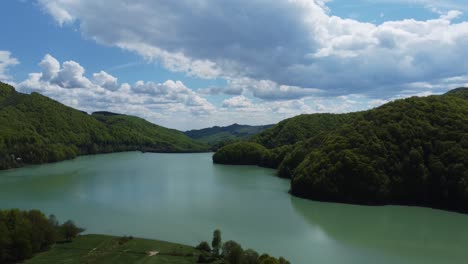 drone shot. aerial view of lake at mountain