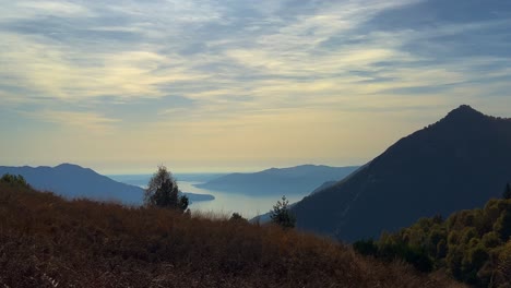 high-angle panoramic viewpoint of lake maggiore seen from monte carza mountain, zoom in