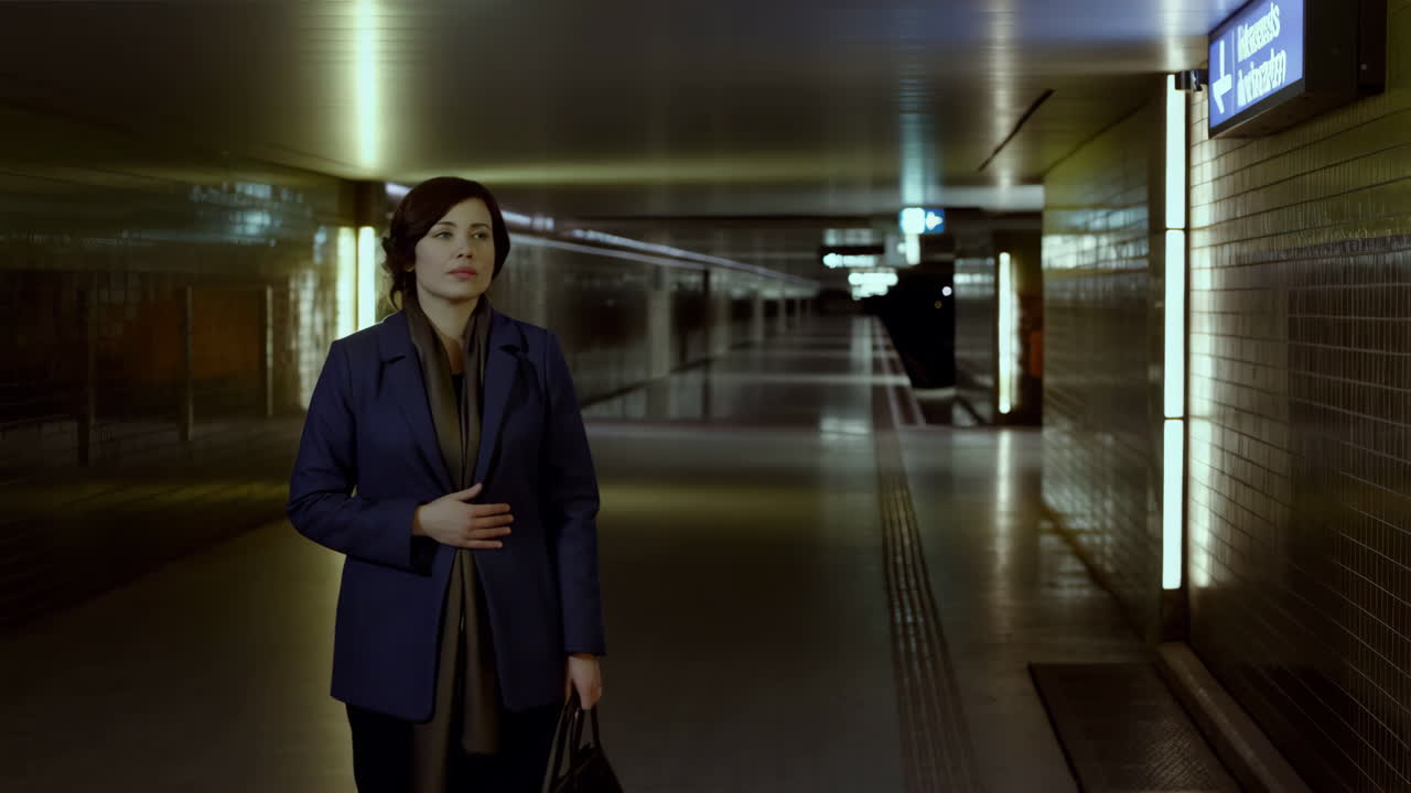 Woman in Subway Tunnel