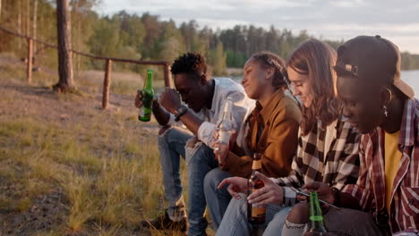 friends relaxing by the lake