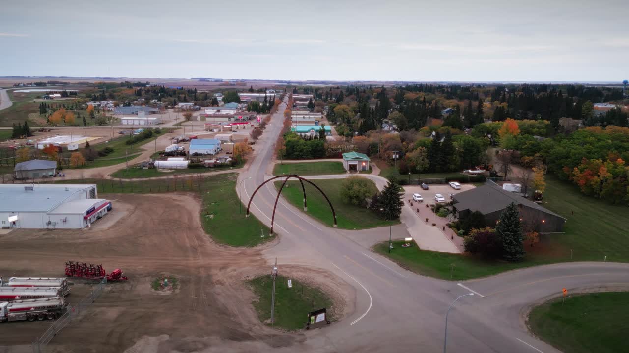 A Wide Angle Long Clip 4K Drone Shot of the Northern Canadian Landscape a Small Rural Town Skiing Fishing Village Main Street Arches in Asessippi Community in Binscarth Russell Manitoba Canada