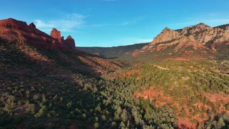 sedimentary red rock mountains in sedona, arizona - aerial drone shot