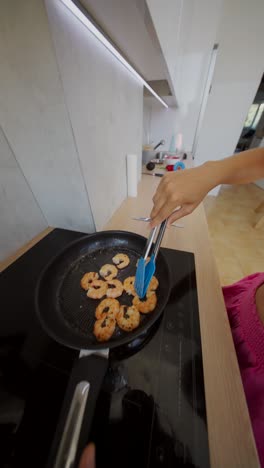 cooking shrimp in a frying pan