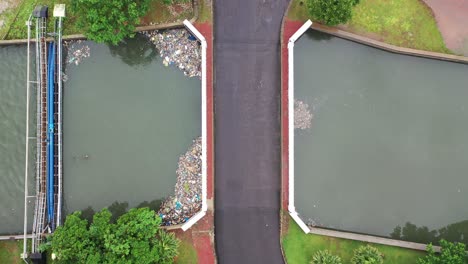 polluted canal bridge with cars and motorbike