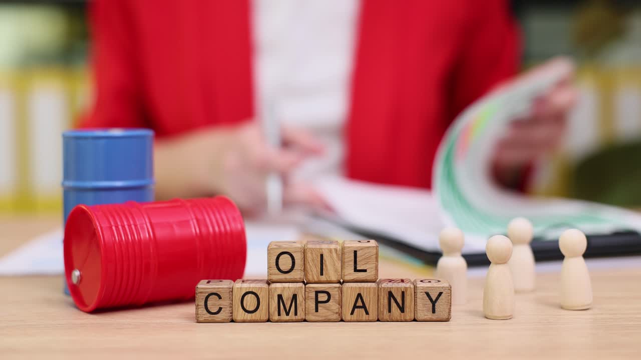 Oil Company Representation with Barrels and Figures