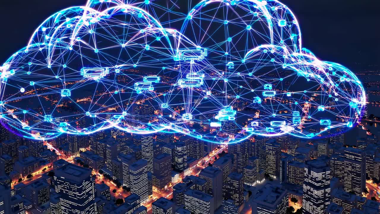Aerial view of a cityscape at night with a digital cloud network overlay, illustrating connectivity