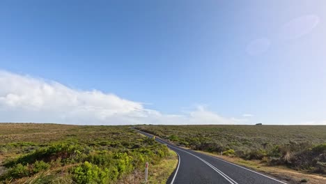 a serene drive through lush landscapes and open skies