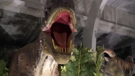 close-up of a scary meat eating dinosaur showing off its razor sharp teeth