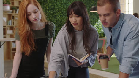 multi ethnic business people brainstorming creative team leader woman sharing ideas enjoying collaborating colleagues working together using laptop in office workplace