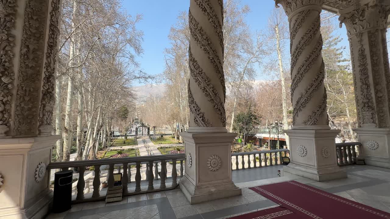 Iranian palace the mansion of luxury marble column in winter season sunshine architecture Haftsin table Nowruz tradition Tehran Tajrish festive decoration candles rustic cultural holiday celebration