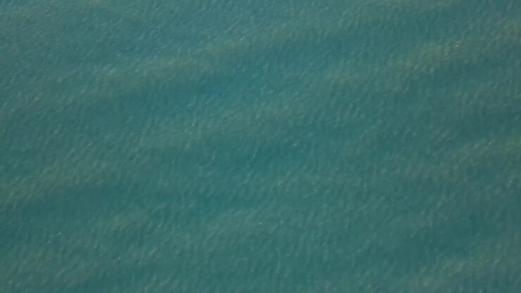 Close Up Of Turquoise Blue Sea Water With Ripples