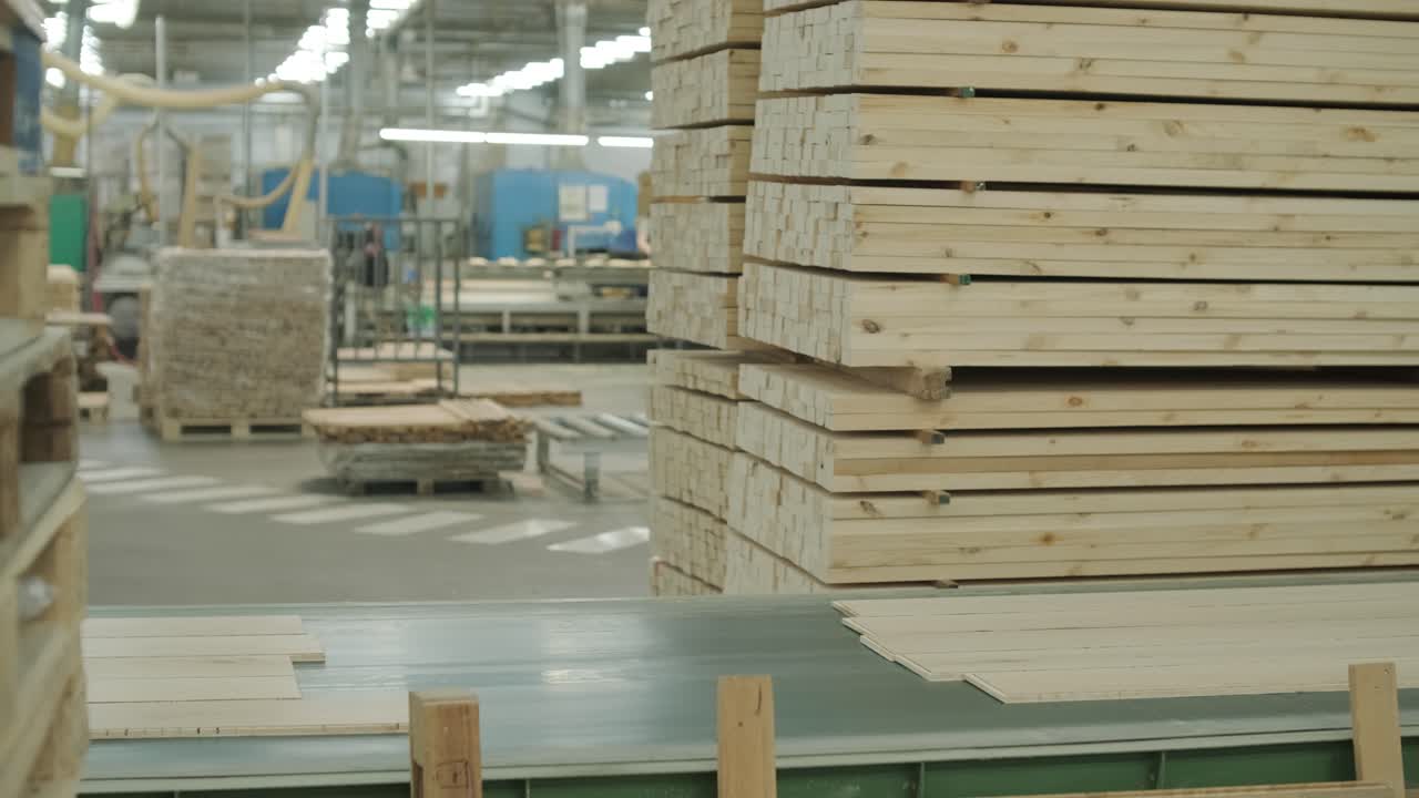 Wooden Planks Moving on Conveyor Belt in Wood Processing Factory