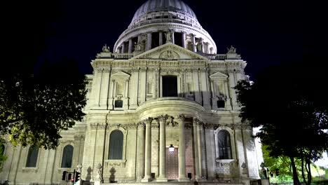 tilting up st. paul`s cathedral and dome illuminated at night in london, uk - commercially usable