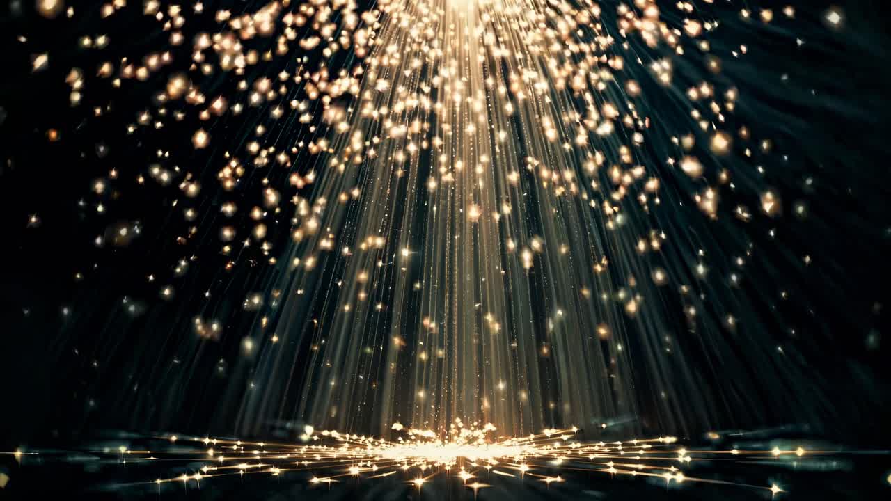A mesmerizing video of golden light particles cascading from above, captured from a low angle